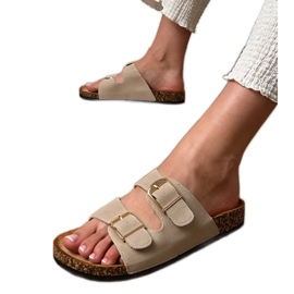 Beige klatschen mit Klemmen auf einer Korkensohle