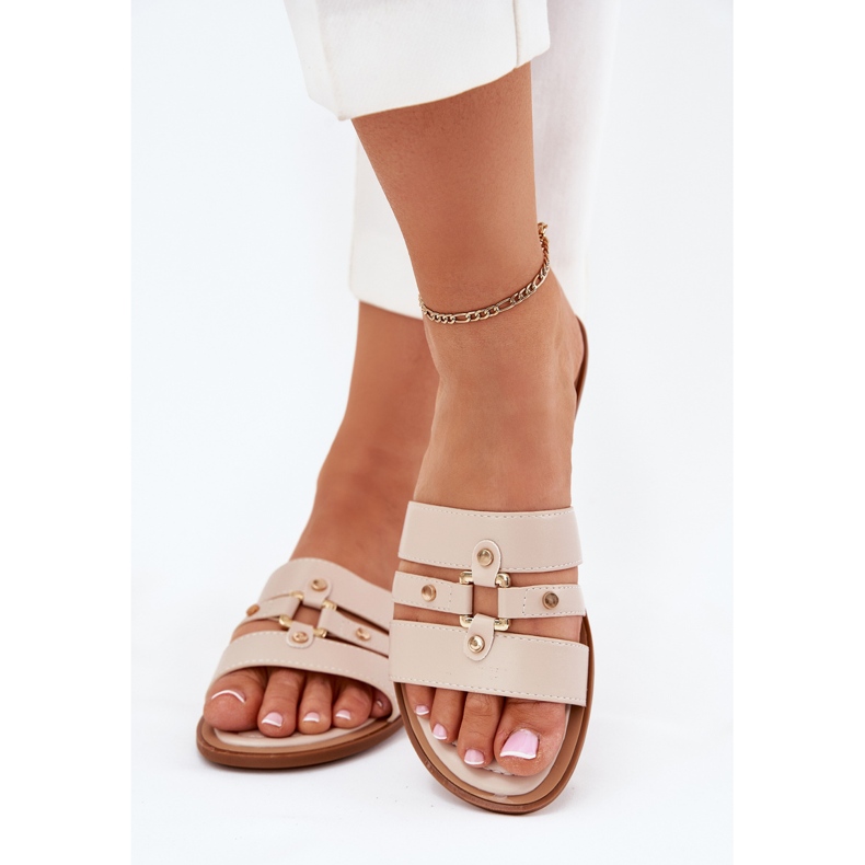 Flat -Frauen -Flip -Flops mit goldenem Detail Beige