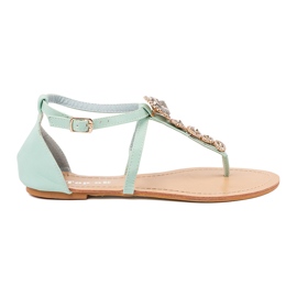 Grüne Sandalen mit Zirkonen dekoriert