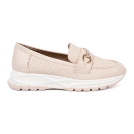 Shelvt Leichte Beige -Slipper mit einem dekorativen goldenen Element