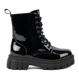 Shelvt Schwarze lackierte Arbeiter auf einer massiven Sohle