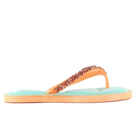 Flip-Flops auf einem orangefarbenen Kissen pt93 blau