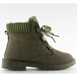 Grüne verdeoscuro isolierte Wanderschuhe