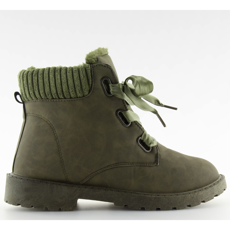 Grüne verdeoscuro isolierte Wanderschuhe