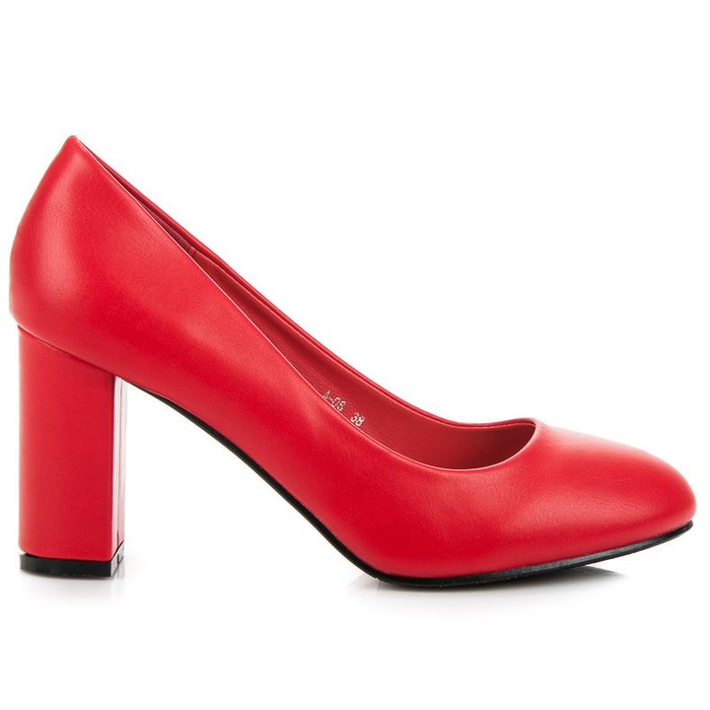 Rote Pumps auf einer Säule