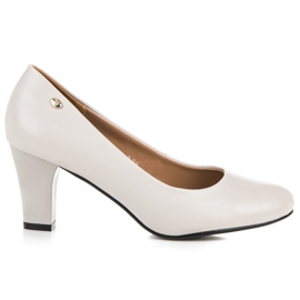 Vices Hellgraue Pumps auf einer Säule