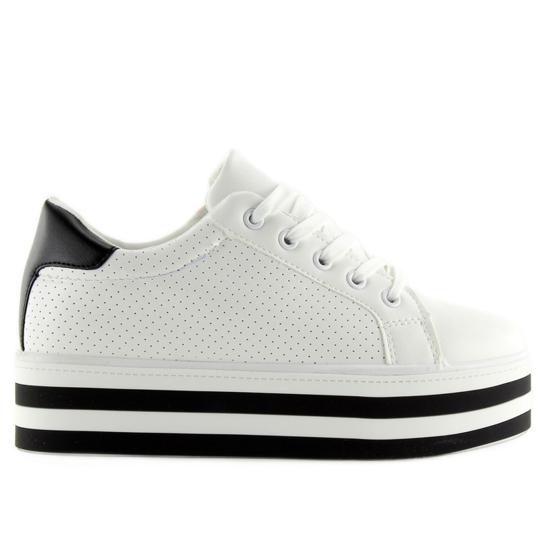 Weiße Turnschuhe auf hoher Sohle