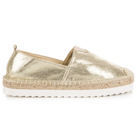 Goldene Espadrilles zum Hineinschlüpfen