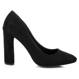 Wildlederpumps an der Säule schwarz