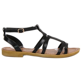 Schwarze flache Sandalen mit Schnalle