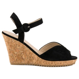 Sandalen auf einem Keilabsatz aus Kork schwarz