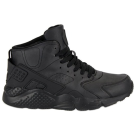 Schwarze Stiefel über dem Knöchel