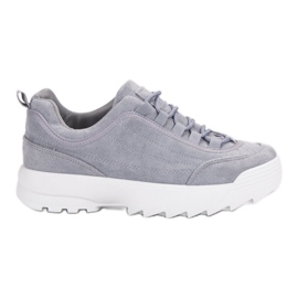 Turnschuhe auf der Plattform grau