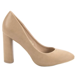 Small Swan Beige Pumps auf einer Säule