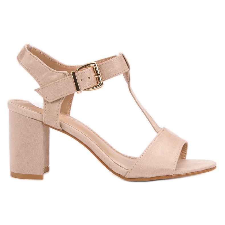 Anesia Paris Beige Sandalen auf einer Bar