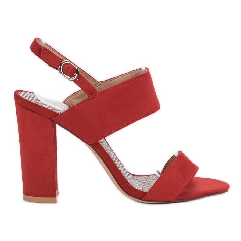 SHELOVET Rote Sandalen auf einer Bar