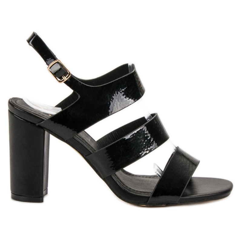 SHELOVET Schwarze Sandalen auf einer Bar