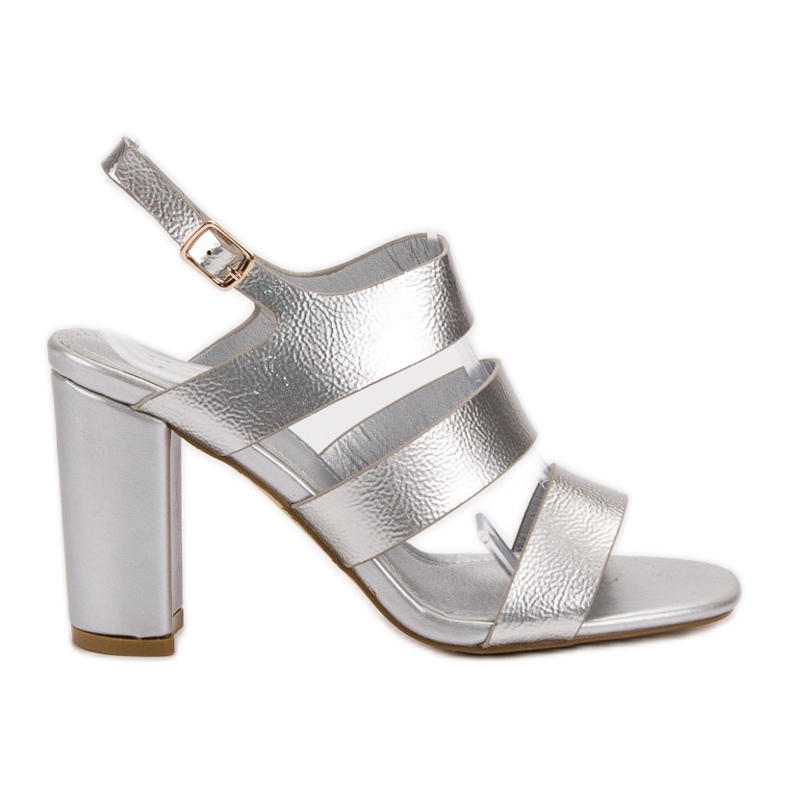 SHELOVET Silberne Sandalen auf einer Bar grau