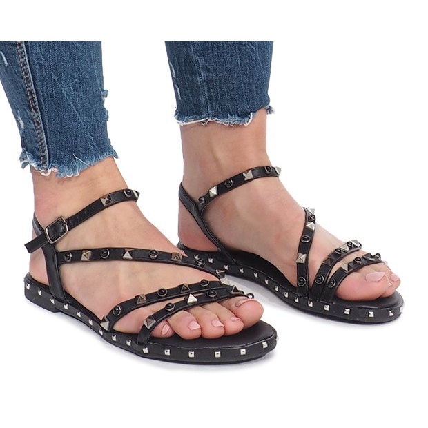 Schwarze flache Sandalen mit Abloom-Nieten
