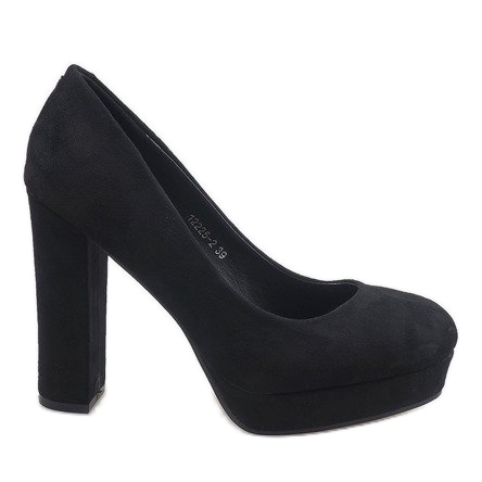 Schwarze Wildleder-Pumps an der Säule 12225-2