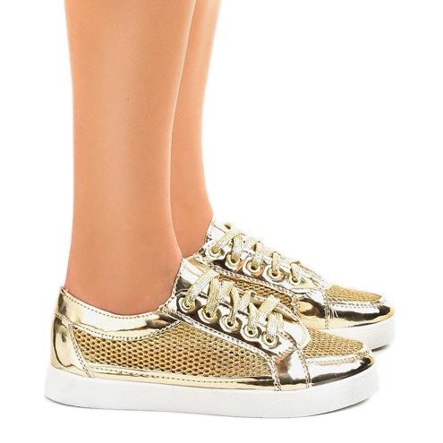 521 goldene durchbrochene Sneakers