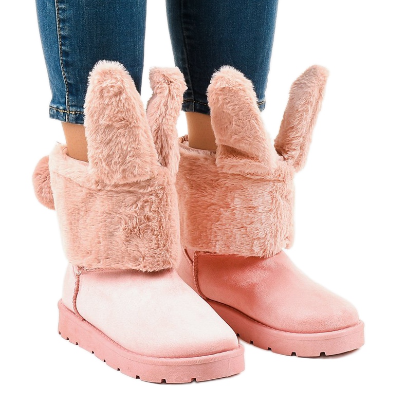 Isolierte rosa Eskimostiefel NB137
