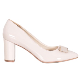 Sergio Leone Elegante Pumps auf einer Säule braun