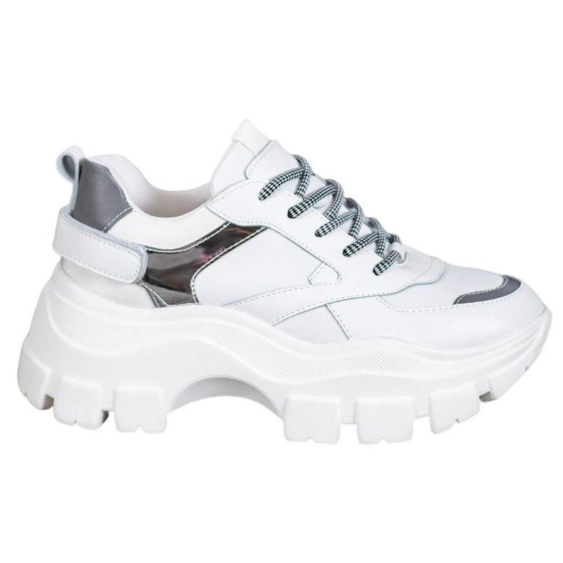 Weide Weiße Turnschuhe auf der Plattform