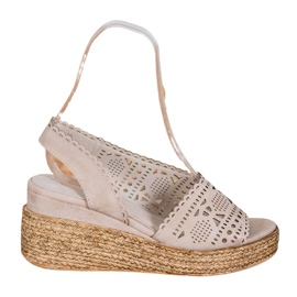 Goodin Durchbrochene Keilsandalen beige golden