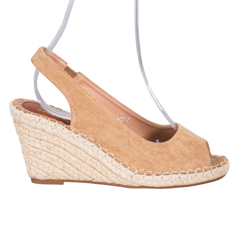 Small Swan Braune Sandalen auf einem hohen Keil