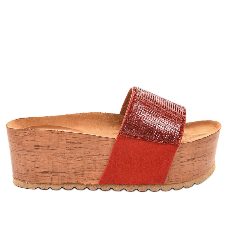 Rote Pantoffeln auf dem Bahnsteig 77-99