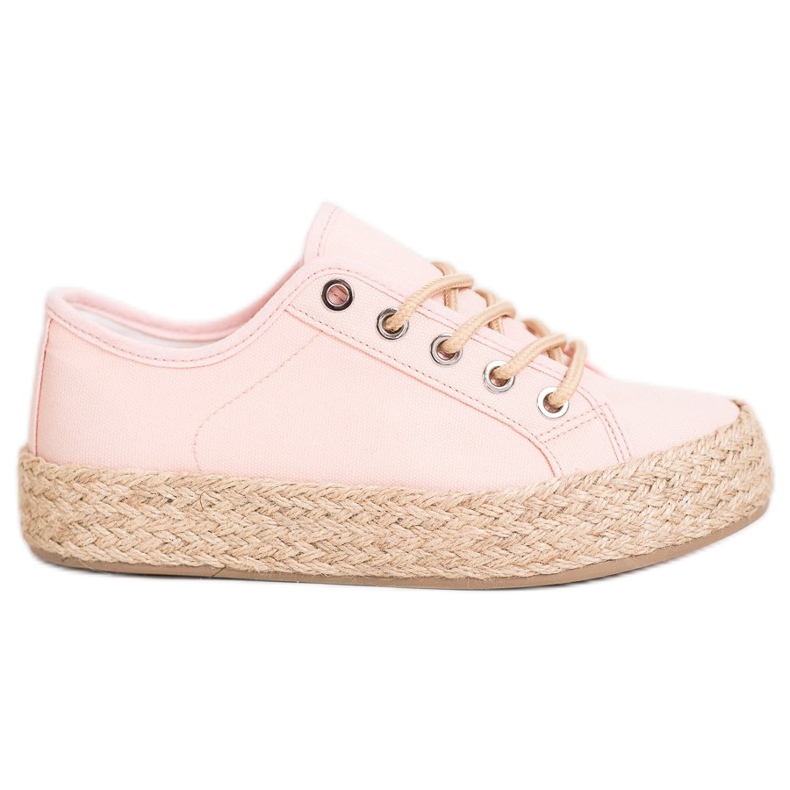 Kylie Turnschuhe auf einer Strohplattform rosa