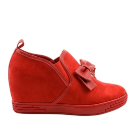 Rote Turnschuhe mit Tifi-Schleife