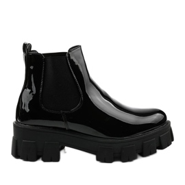 Schwarze Stiefel auf der Lilney NC1086-Plattform