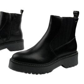 Schwarze flache Stiefel aus Cavern-Ökoleder