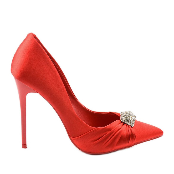 Rote Pumps auf einem Red Devil Absatz