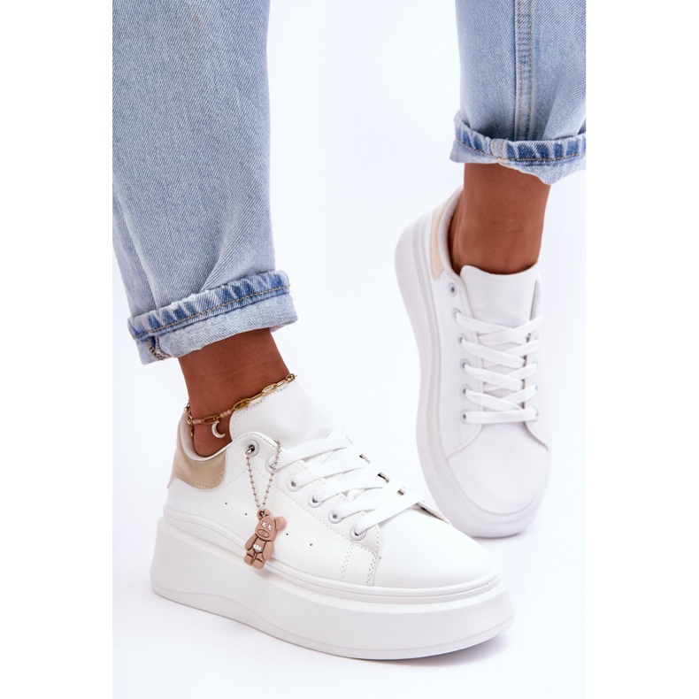 PS1 Damen-Sportschuhe auf einer massiven Plattform in Weiß und Gold Mariell 1