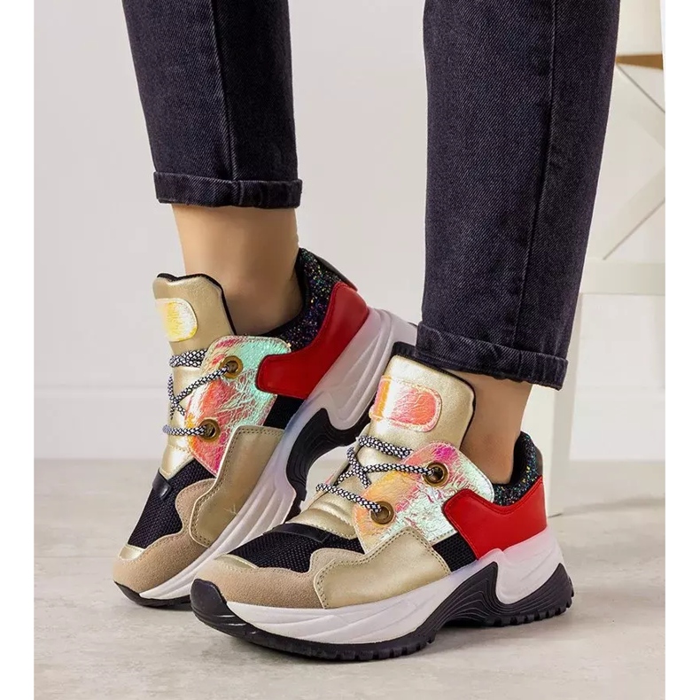 Goldene Sneaker mit hoher Spring-Sohle schwarz 1