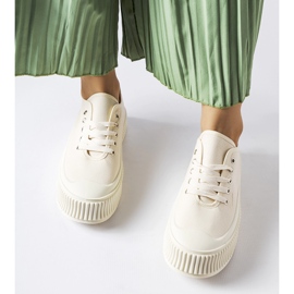 Beigefarbene Sneakers auf einem dicken Rina-Plateau 1