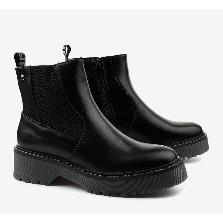 Schwarze flache Stiefel aus Cavern-Ökoleder 1