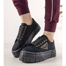 Schwarze Sneaker auf dicker Giselle-Sohle 1