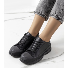 Schwarze Turnschuhe auf einer dicken Nurbik-Sohle 1