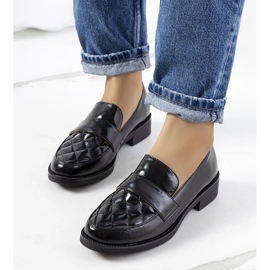 Alexans schwarze Slipper 1