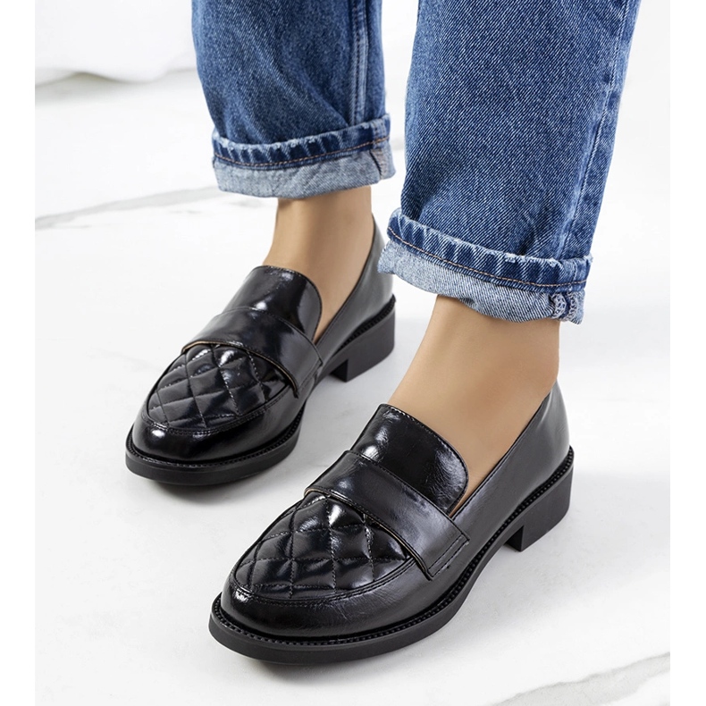 Alexans schwarze Slipper 1