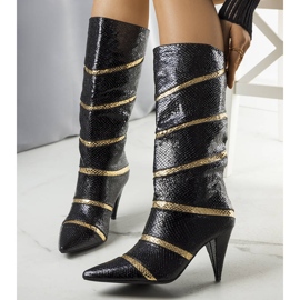 Schwarz-goldene isolierte Nevzo-Stiefel 1