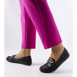 Schwarze Slipper mit mattem Finish von Sorel 1