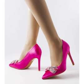 Neonpinke Pins mit Satin-Finish und einer Mia-Schleife rosa 2