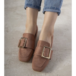 BM Pinke Pumps an einer Säule mit Next-Schnalle rosa 1