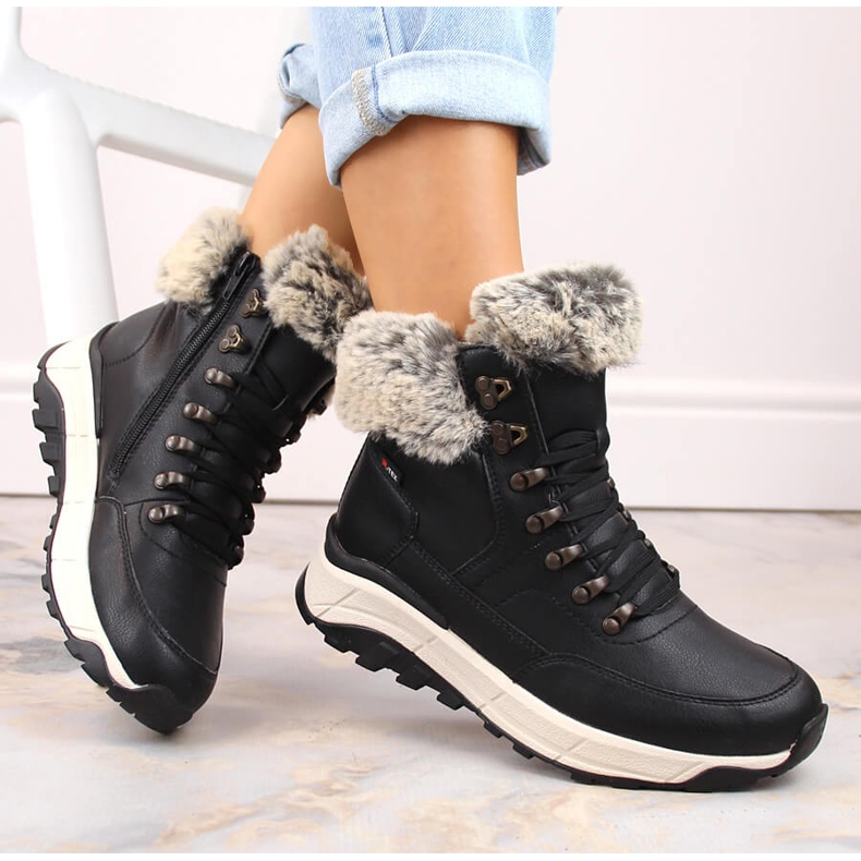 Wasserdichte Damenstiefeletten aus Leder, isoliert mit Wolle, schwarz Rieker W0063-00 1