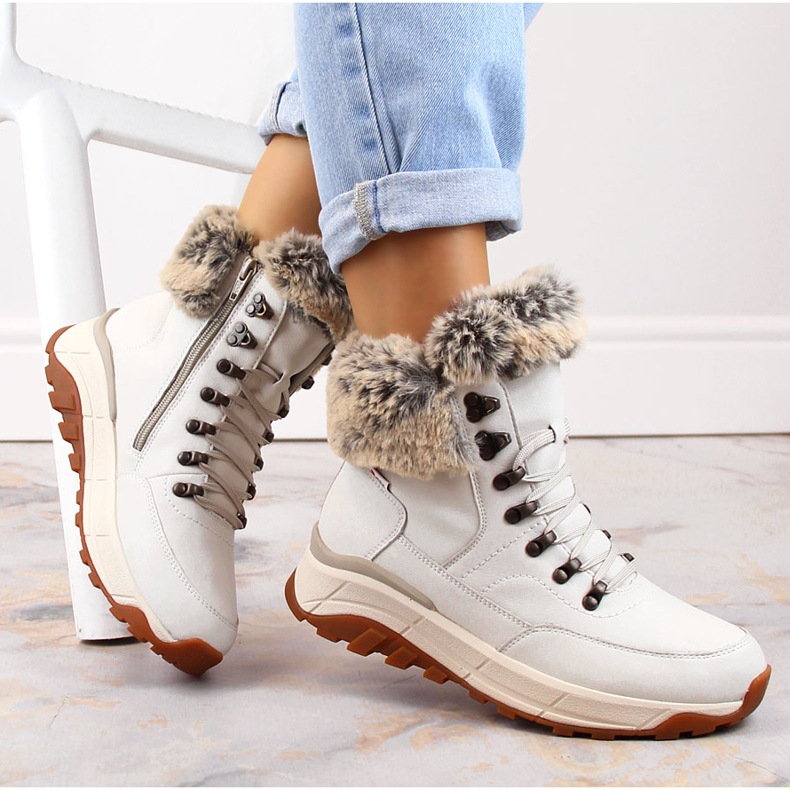 Wasserdichte Damenstiefeletten aus Leder, isoliert mit Wolle, weiß Rieker W0063-80 1